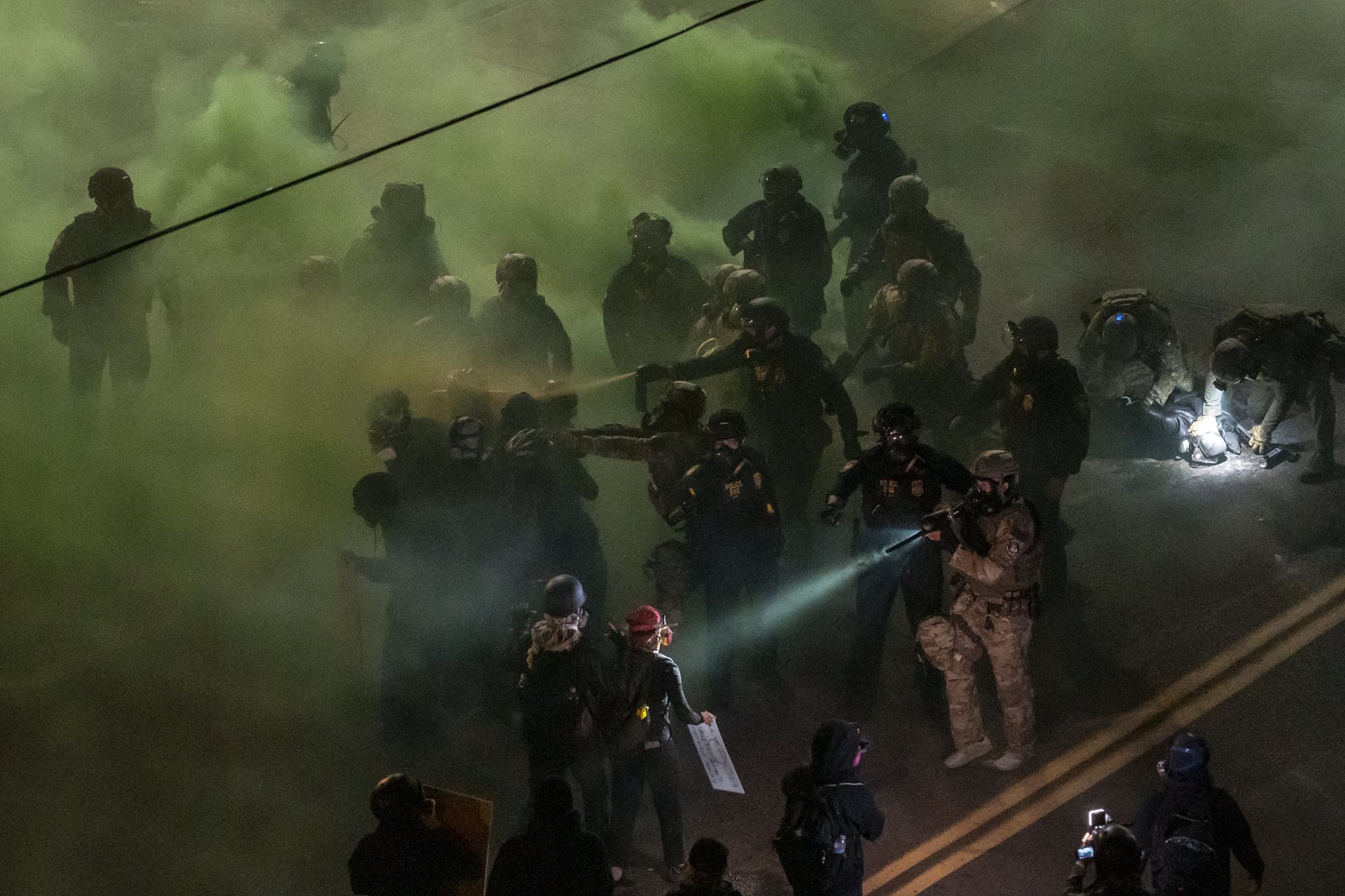 <p>Officers from the Department of Homeland Security and federal tactical units clash with demonstrators during a nightly standoff at a Portland ICE facility in Oregon, United States. These intense protests centered on opposing the administration&rsquo;s escalating mass-deportation agenda and its shift toward interior enforcement.&nbsp;</p>
<br />
&nbsp;
